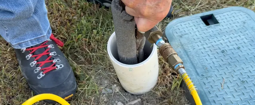 Test port on a main water line for air injection